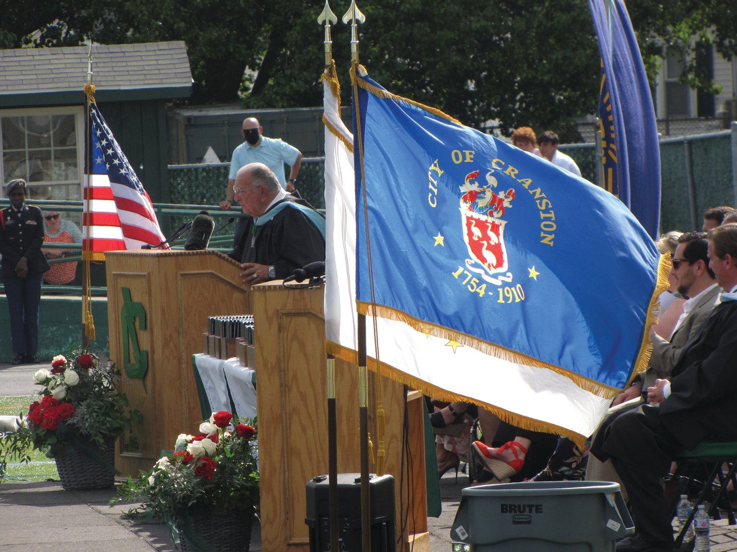FOREVER PART OF CRANSTON : Michael Traficante, former mayor and current citywide representative on the School Committee, delivered remarks that he acknowledged were not “traditional.” Among his words of advice to the graduates? “Always be kind to your knees.”